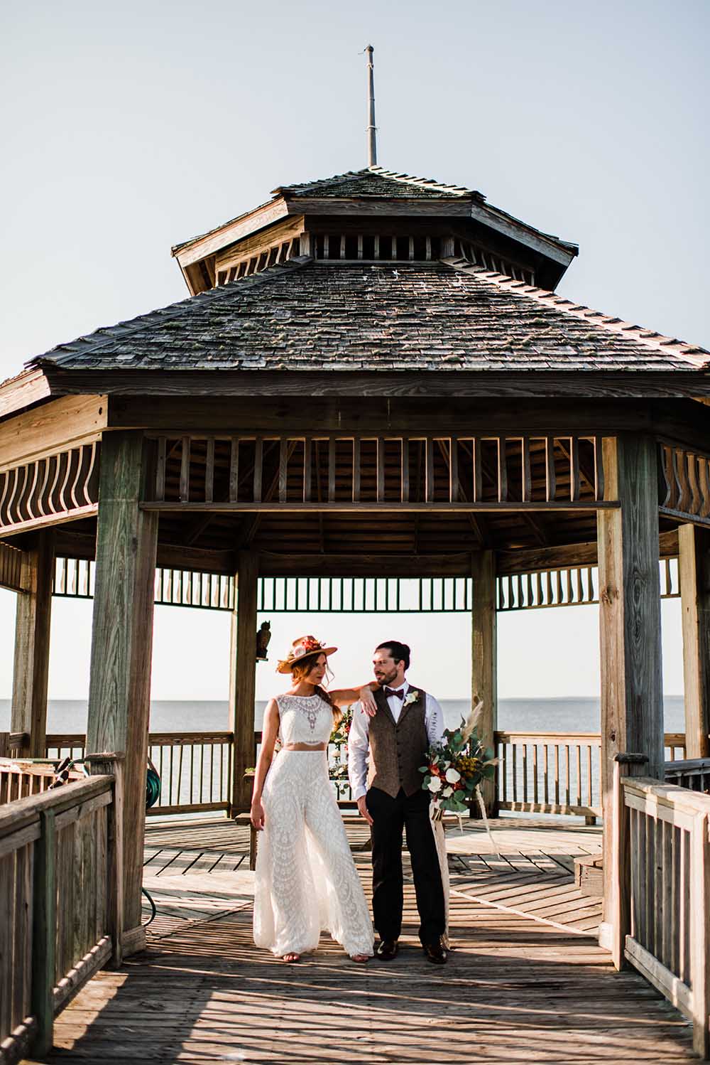 Boho Coastal Microwedding Dinner on Pier | photo by MBM Photography | featured on I Do Y'all
