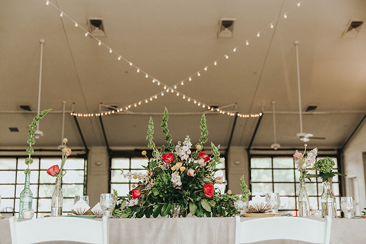 Red, Yellow & Pink Large Table Flower Centerpieces | photo by Deltalow | featured on I Do Y'all