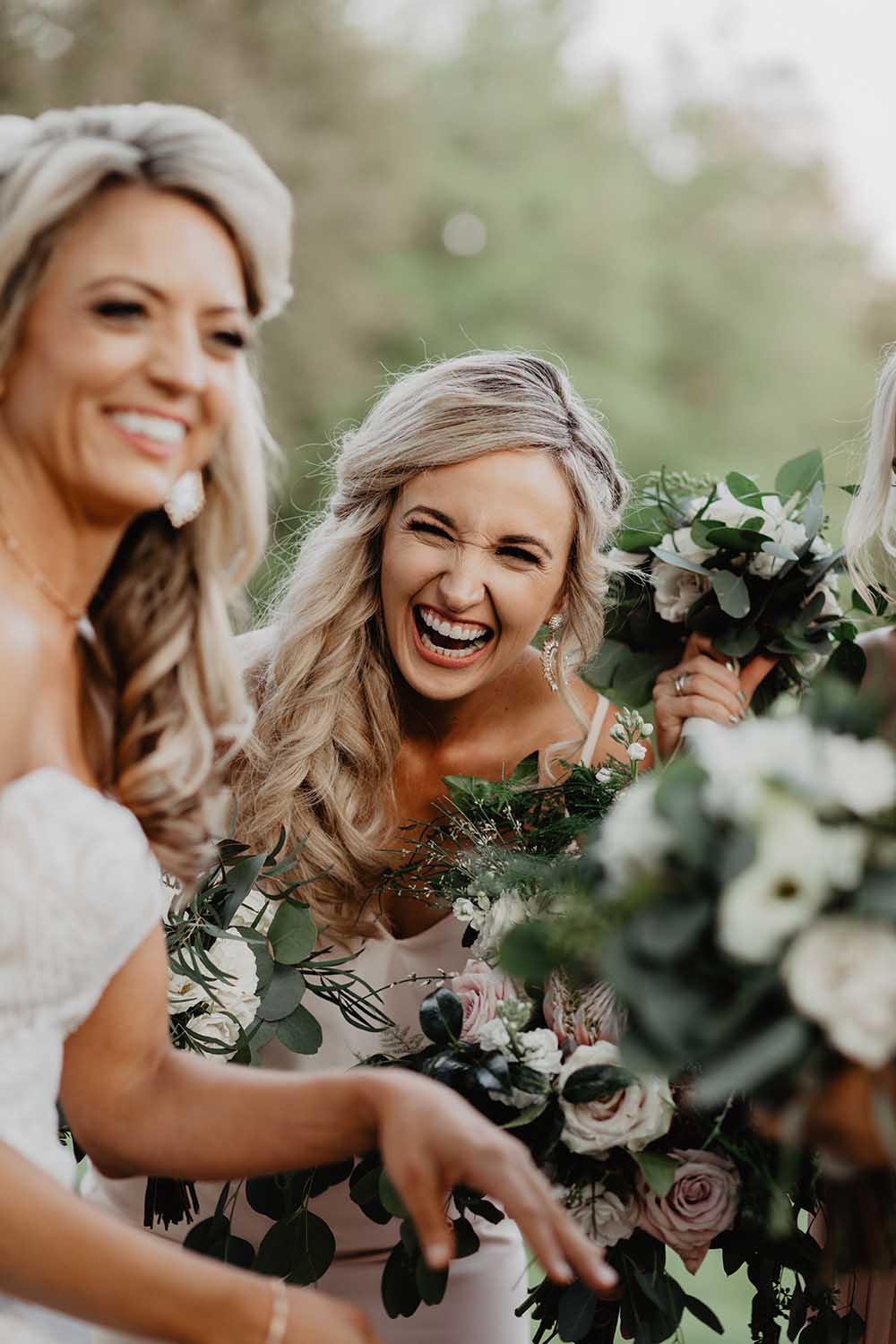 Bride & Bridesmaids Laughing Pose | photo by Emily Green Photography | featured on I Do Y'all