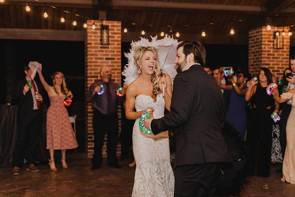 Bride with Second Line Umbrella & Tambourine | photo by Emily Green Photography | featured on I Do Y'all