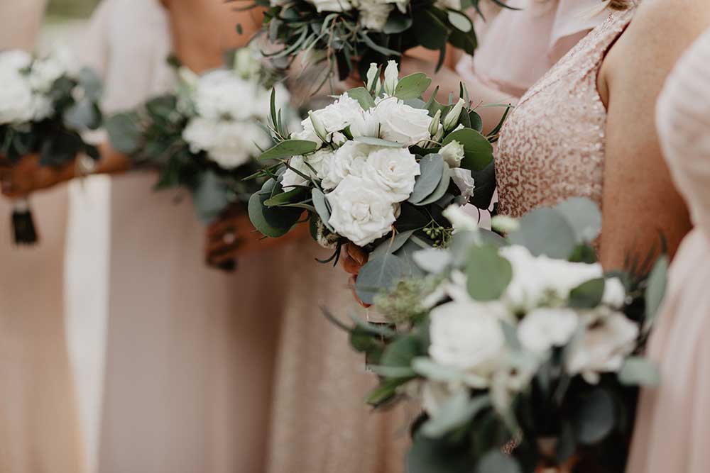 White Rose Bridesmaid Bouquets | photo by Emily Green Photography | featured on I Do Y'all