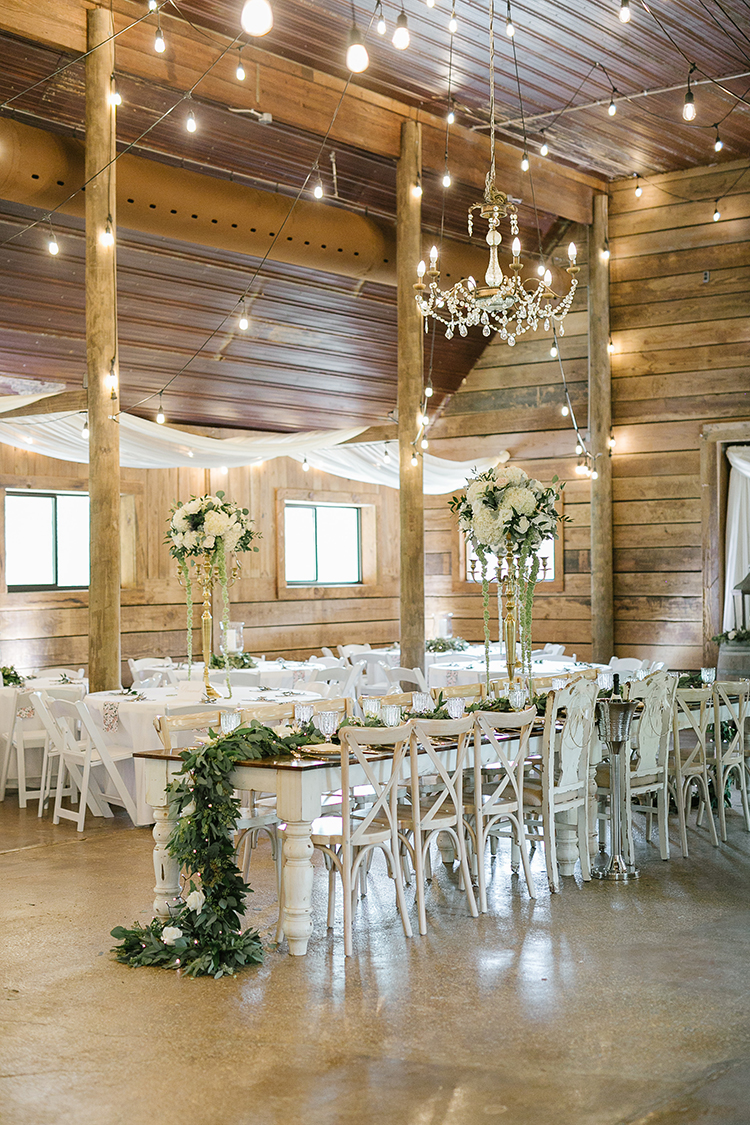 Long Head Table at Wedding with Greenery Runner at The Venue at Southern Oaks | photo by Julie Holmes Photography | featured on I Do Y'all