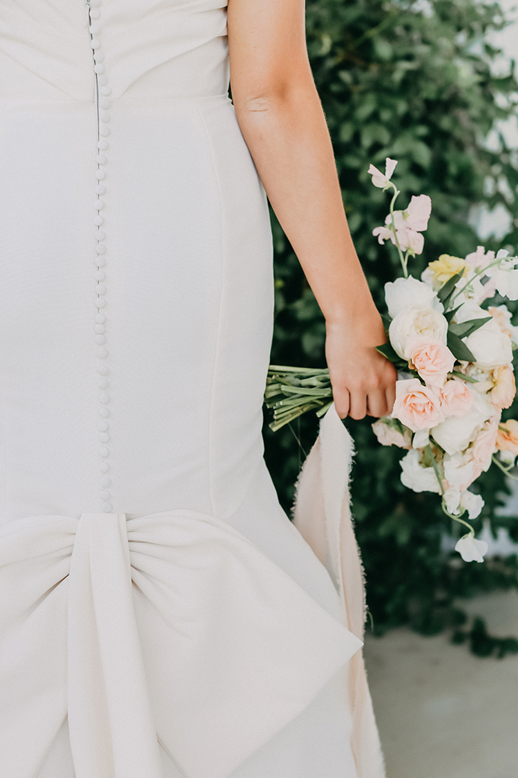 Buttons on Wedding Dress with Bow | photo by Pendo Photography | featured on I Do Y'all 