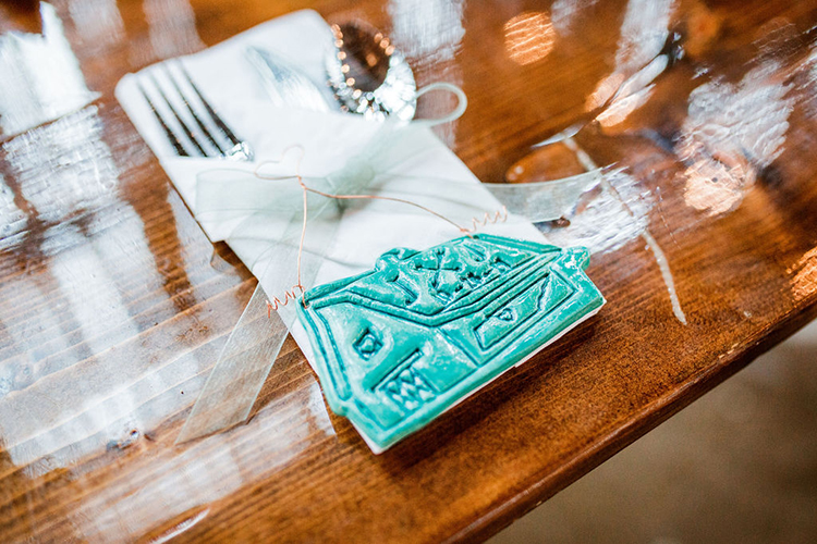 Handmade colorful barn Christmas ornament for wedding guest favor | photo by John Myers Photography | featured on I Do Y'all