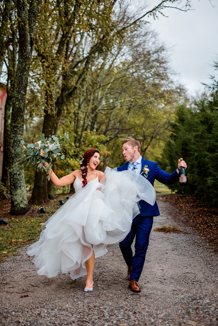 Bride & Groom Skipping After Wedding | photo by John Myers Photography | featured on I Do Y'all