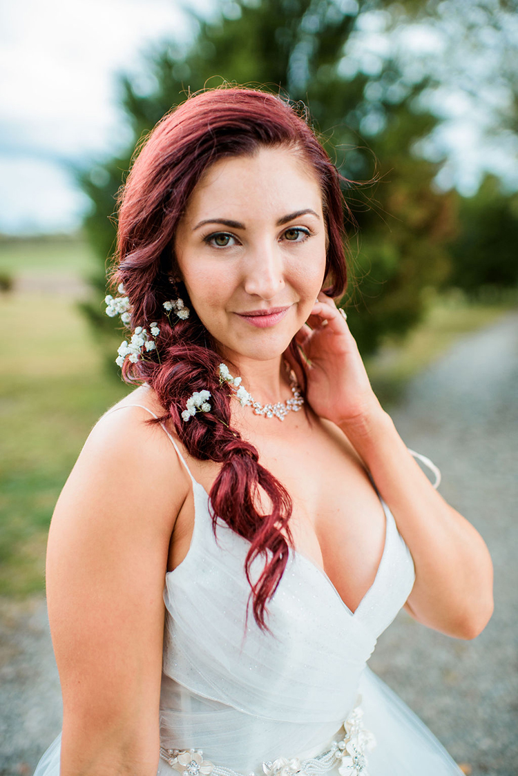 FIshtail braid wedding hairstyle with baby's breath tucked in | photo by John Myers Photography | featured on I Do Y'all
