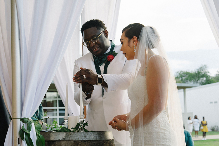 Bride & Groom Lighting Unity Candle | photo by Staci Lewis Photography | featured on I Do Y'all