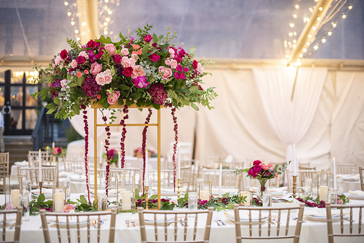 Bright Pink and Burgundy Floral Arrangement for Hotel Rooftop Wedding | photo by Jessica Merithew Photography | featured on I Do Y'all