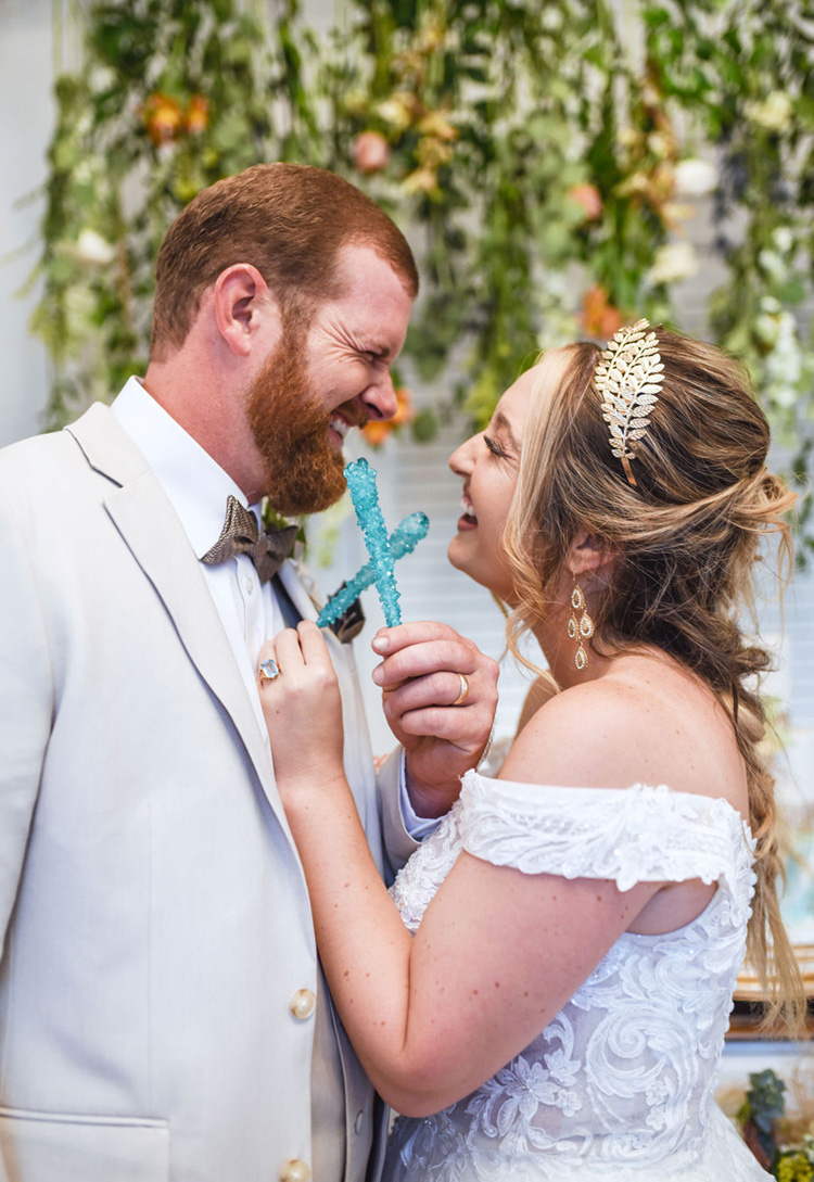 Rock Candy Wedding Toast | Bride & Groom Toasting with Rock Candy Sticks | photo by Radiant Photography by Sydney Danielle