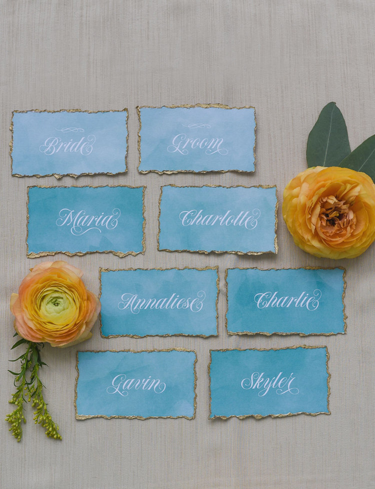 Turquoise Watercolor Wedding Place Cards with Gold Foil Rim & Calligraphy Names | photo by Radiant Photography by Sydney Danielle