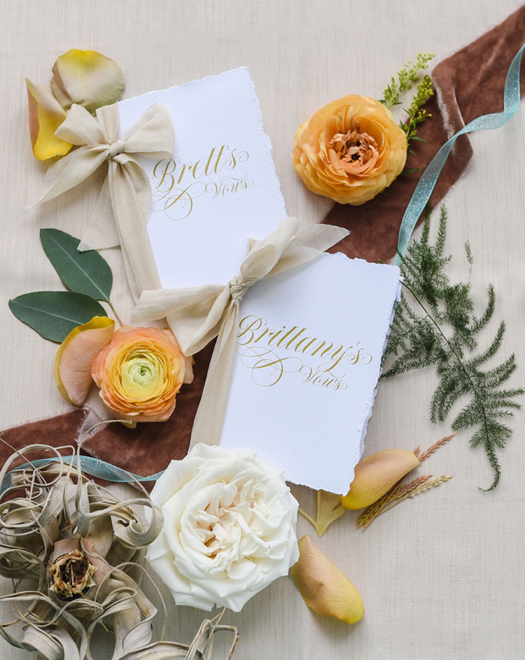 Elegant Vowbooks with Calligraphy Cover and Ribbon | photo by Radiant Photography by Sydney Danielle