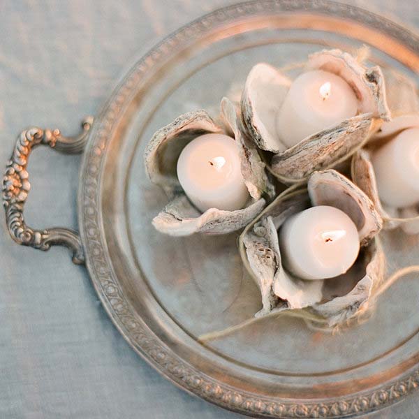 Oyster Candle Holders | Coastal Wedding Decor | photo by Jose Villa