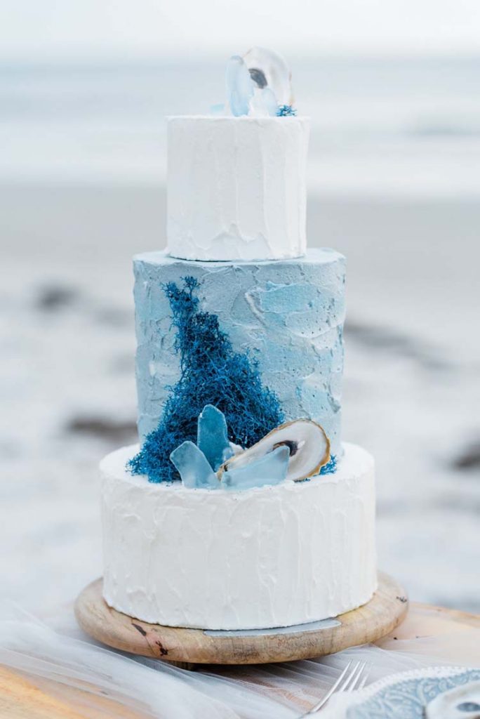 Blue Watercolor Wedding Cake with Oyster Shells | photo by Amanda Zabrocki Photography