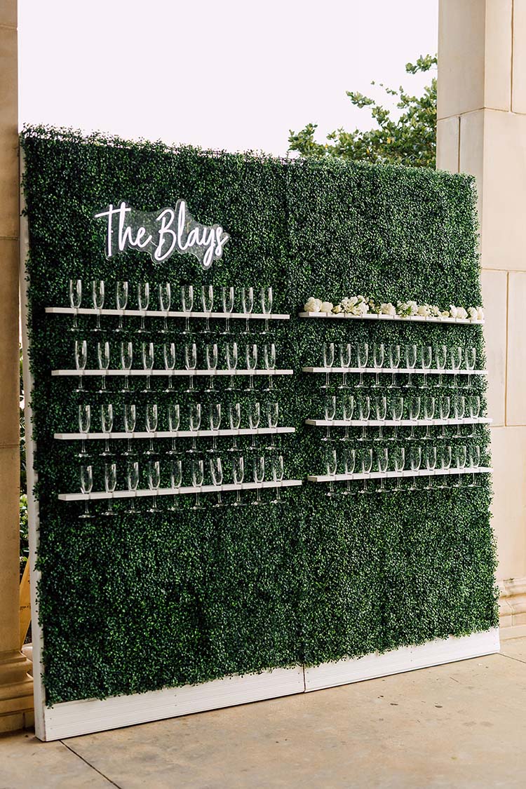 Champagne Wall with Boxwood Hedge and Neon Sign | photo by Madison Hope Photography | featured on I Do Y'all