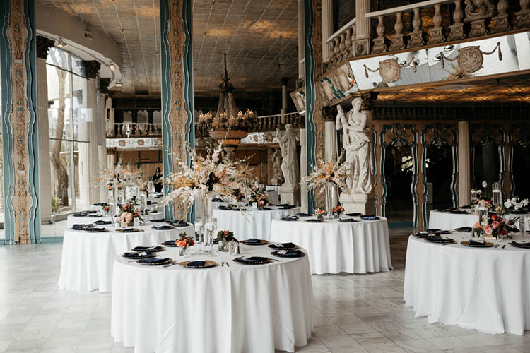 Greek & Italian Inspired Wedding Reception Venue with Columns & Marble Statues | photo by The Portos