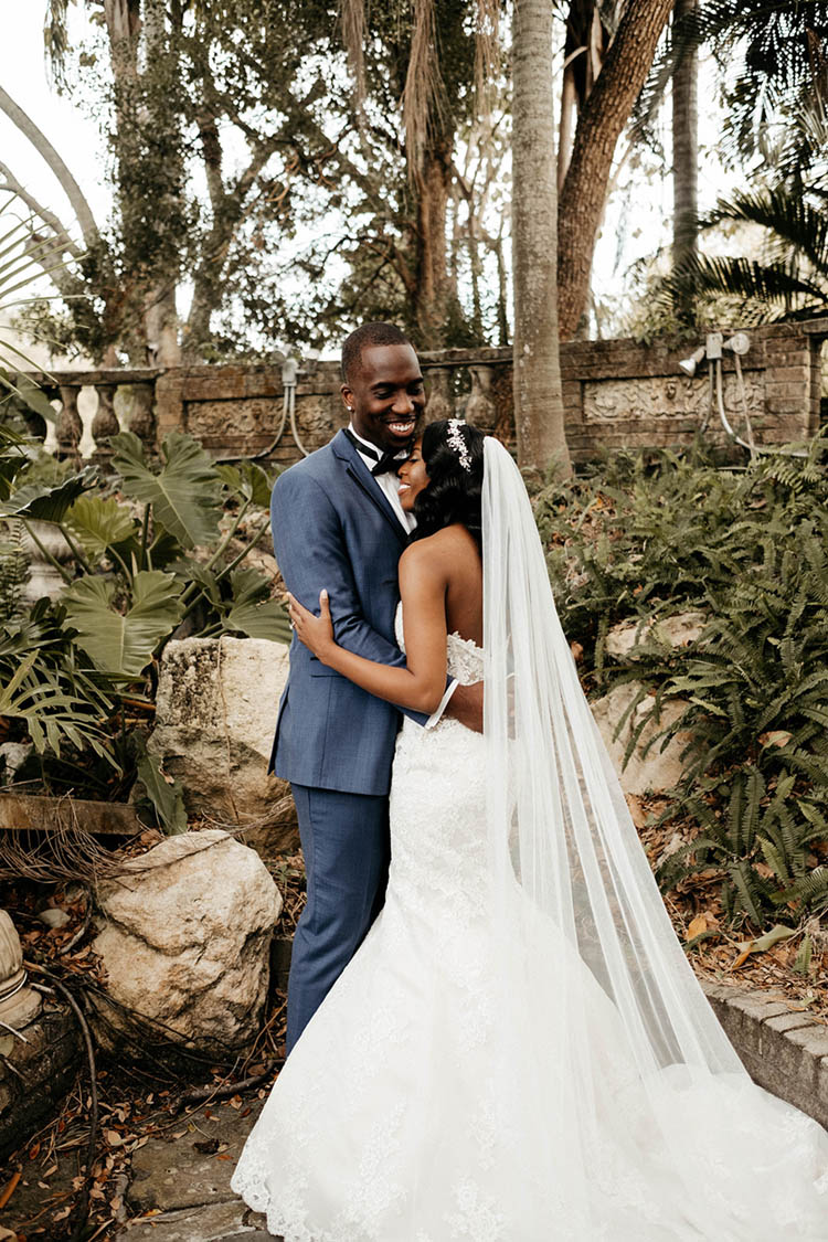 Bride & Groom Hugging During First Look at Glamorous Wedding | photo by The Portos