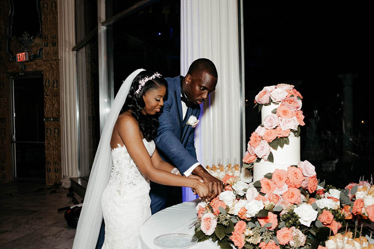 Cake Cutting at Glamorous Wedding | photo by The Portos