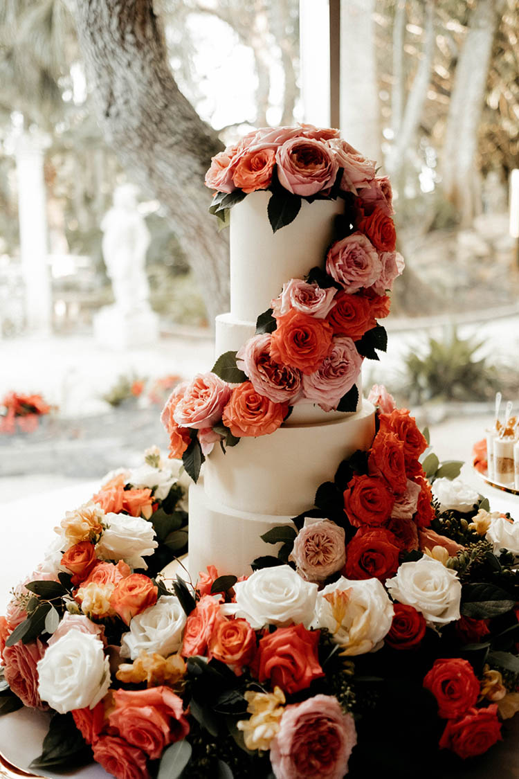 4-Tiered Wedding Cake Covered in Pink & Peach Roses | photo by The Portos