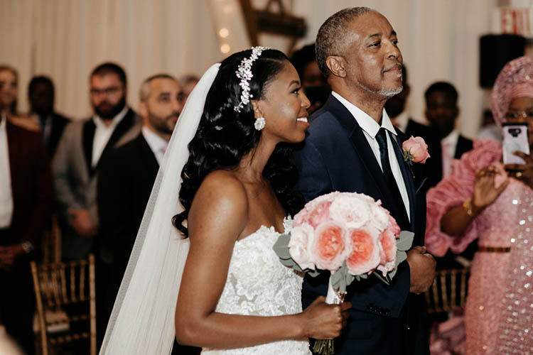 Bride Walking Down Aisle with Father | photo by The Portos