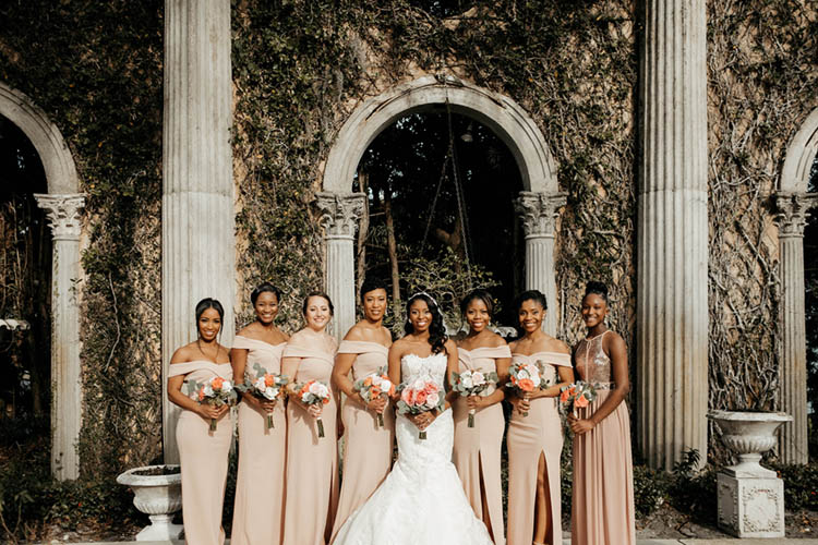 Bridesmaids in Neutral Off the Shoulders Gowns | photo by The Portos