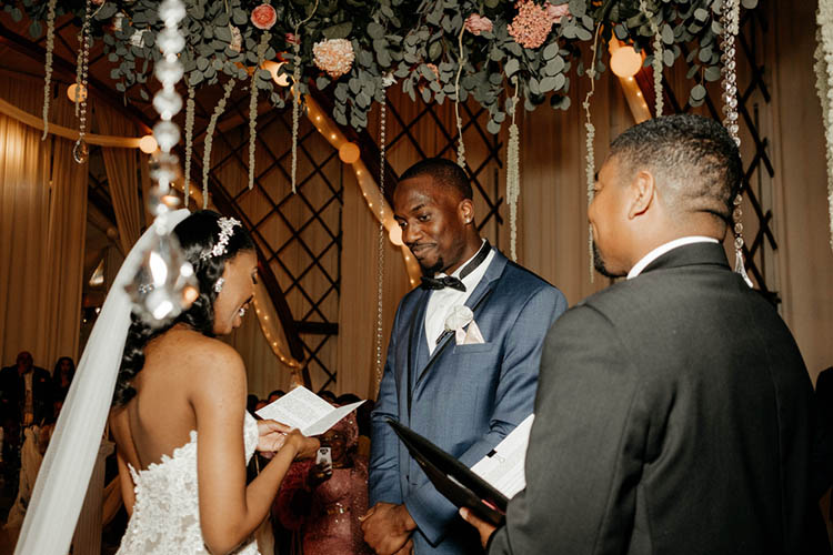 Glamorous Wedding Ceremony with Floral & Jewel Hanging Centerpiece | photo by The Portos