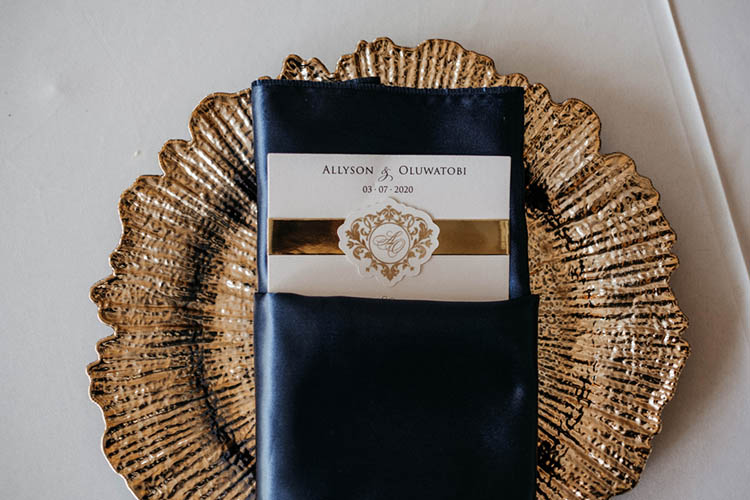 Gold Ripple Edged Chargers with Silk Blue Napkins & Wedding Menu | photo by The Portos