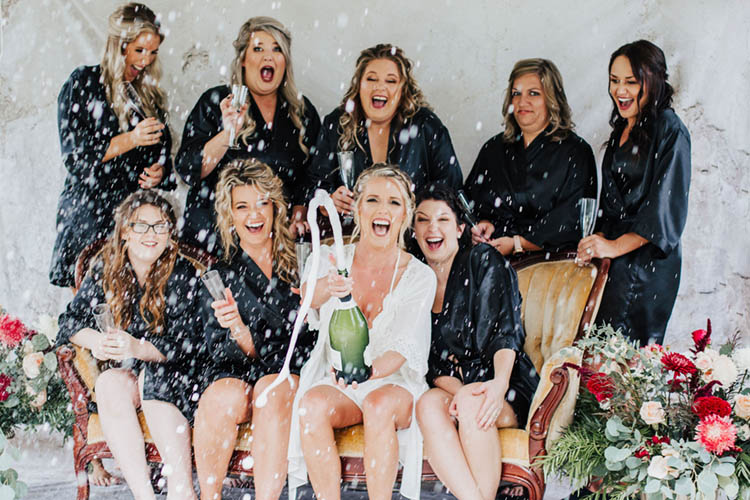 Bride Champagne Pop with Bridesmaids in Robes | photo by Jessica Lee Photographic Art