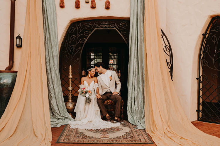 Moroccan Inspired Wedding Ceremony with Elaborate Draping and Rugs | photo by Boote Photography Studio